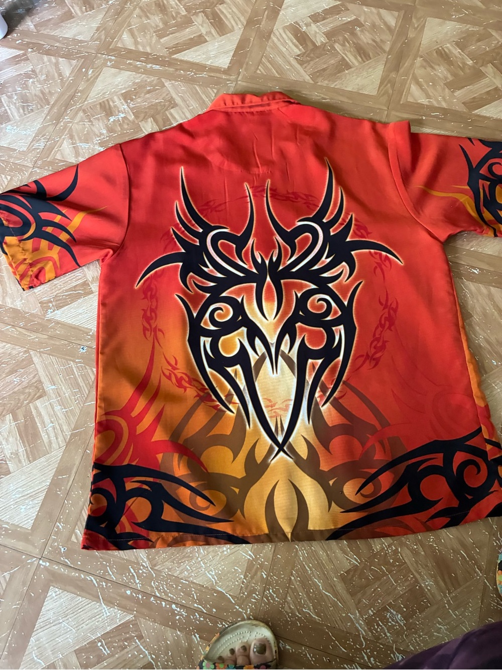 No Boundaries Red and Orange Tribal-Graphic Short Sleeve Polo